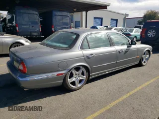 2005 Jaguar XJ with VIN SAJWA79C15SG40523, listed as a Copart auction lot 77994844 with 113,634 mi miles and Clean Title. Bid and sale history available at carsss.com. Image 3.