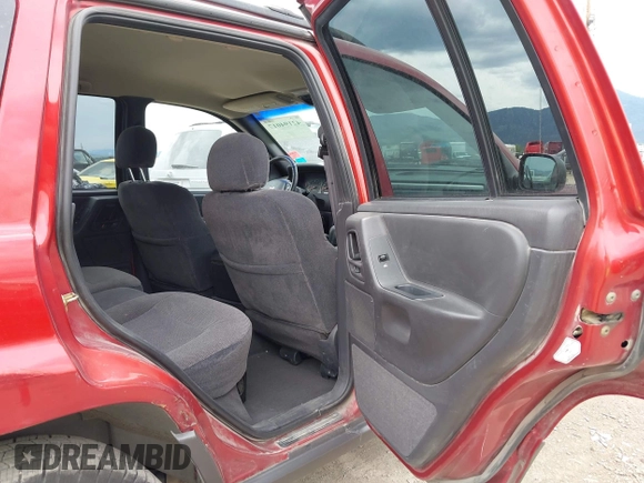 2001 Jeep Grand Cherokee Laredo with VIN 1J4GW48N51C732011, listed as a IAAI auction lot 42194017 with 195,716 mi miles and . Bid and sale history available at DreamBid. Image 8.