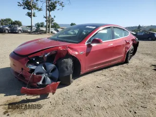 2019 Tesla Model 3 Mid Range z VIN 5YJ3E1EA3KF312453, wystawiony jako Copart lot #57841605 z przebiegiem 77 366 mil mil oraz Szkoda całkowita • Salvage title. Historia ofert i sprzedaży dostępna na DreamBid. Obrazek 1.