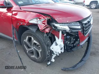 2023 Hyundai Tucson SEL z VIN 5NMJFCAE3PH217938, wystawiony jako IAAI lot #40916663 z przebiegiem 11 233 mil mil oraz . Historia ofert i sprzedaży dostępna na DreamBid. Obrazek 6.