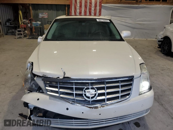 2009 Cadillac DTS 1SC z VIN 1G6KD57Y59U118737, wystawiony jako Copart lot #80776524 z przebiegiem 123 001 mil mil oraz Szkoda całkowita • Salvage title. Historia ofert i sprzedaży dostępna na DreamBid. Obrazek 5.