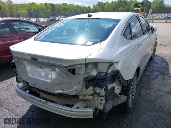 2017 Ford Fusion Titanium with VIN 3FA6P0K90HR266556, listed as a IAAI auction lot 41947924 with 135,628 mi miles. Bid and sale history available at carsss.com. Image 6.
