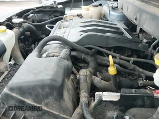 2013 Dodge Journey American Value z VIN 3C4PDCAB6DT665336, wystawiony jako IAAI lot #43511976 z przebiegiem 185 019 mil mil oraz . Historia ofert i sprzedaży dostępna na DreamBid. Obrazek 12.