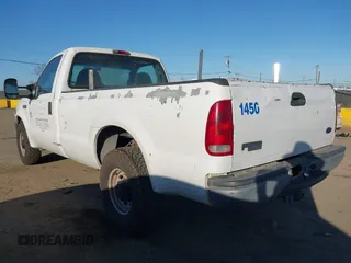 2002 Ford Super Duty F-250 XL with VIN 1FTNF20L72EB79640, listed as a IAAI auction lot 41667865 with 153,384 mi miles. Bid and sale history available at carsss.com. Image 3.