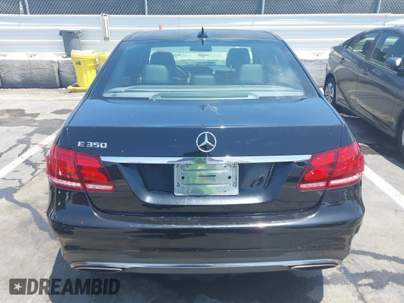 2014 Mercedes-Benz E 350 Sport with VIN WDDHF5KB1EB015573, listed as a IAAI auction lot 42731599 with 233,540 mi miles and . Bid and sale history available at DreamBid. Image 16.