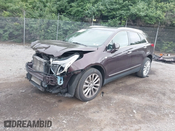 2017 Cadillac XT5 Platinum AWD z VIN 1GYKNFRS2HZ224860, wystawiony jako IAAI lot #42272142 z przebiegiem 95 697 mil mil oraz . Historia ofert i sprzedaży dostępna na DreamBid. Obrazek 20.