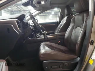 2020 Lexus RX 450h with VIN 2T2JGMDA8LC049608, listed as a Copart auction lot 58068145 with 67,935 mi miles and Salvage title. Bid and sale history available at DreamBid. Image 7.