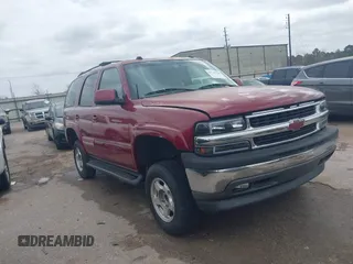 2004 Chevrolet Tahoe LT with VIN 1GNEC13Z34J203100, listed as a IAAI auction lot 41749196 with 188,416 mi miles. Bid and sale history available at carsss.com. Image 1.