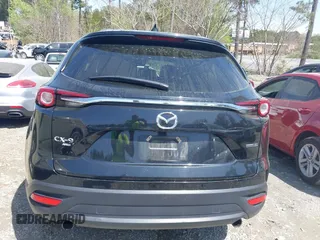 2023 Mazda CX-9 Touring Plus with VIN JM3TCBAY9P0657854, listed as a IAAI auction lot 41931409 with 54,036 mi miles and . Bid and sale history available at DreamBid. Image 16.
