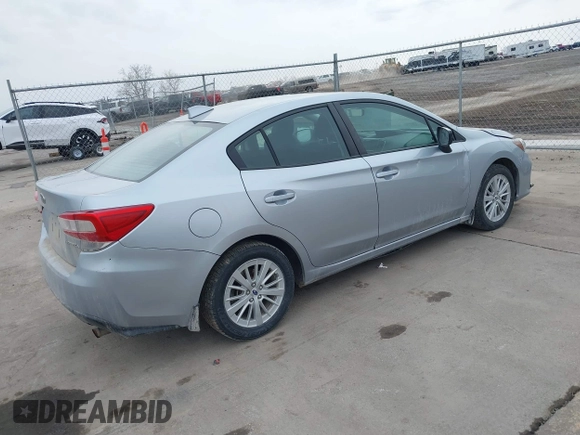 2018 Subaru Impreza Premium z VIN 4S3GKAD67J3604898, wystawiony jako IAAI lot #41694176 z przebiegiem 97 287 mil mil oraz . Historia ofert i sprzedaży dostępna na DreamBid. Obrazek 4.