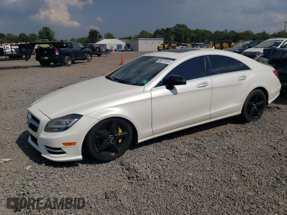 2014 Mercedes-Benz CLS-Class CLS 550 with VIN WDDLJ9BB9EA117290, listed as a Copart auction lot 68517414 with 98,705 mi miles and Salvage Title. Bid and sale history available at carsss.com. Image 1.