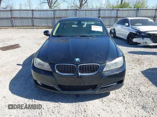 2011 BMW 3 Series 335i xDrive with VIN WBAPL5G50BNN23199, listed as a IAAI auction lot 42041719 with 205,807 mi miles. Bid and sale history available at carsss.com. Image 12.