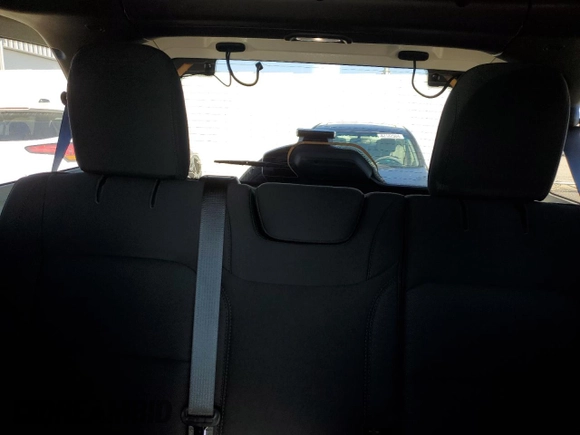 2021 Jeep Wrangler Unlimited Freedom z VIN 1C4HJXDG1MW780092, wystawiony jako Copart lot #82361854 z przebiegiem 43 256 mil mil oraz Szkoda całkowita • Salvage title. Historia ofert i sprzedaży dostępna na DreamBid. Obrazek 10.