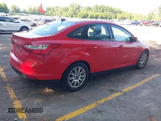 2012 Ford Focus SE with VIN 1FAHP3F24CL239326, listed as a IAAI auction lot 42668240 with 140,268 mi miles and . Bid and sale history available at DreamBid. Image 4.