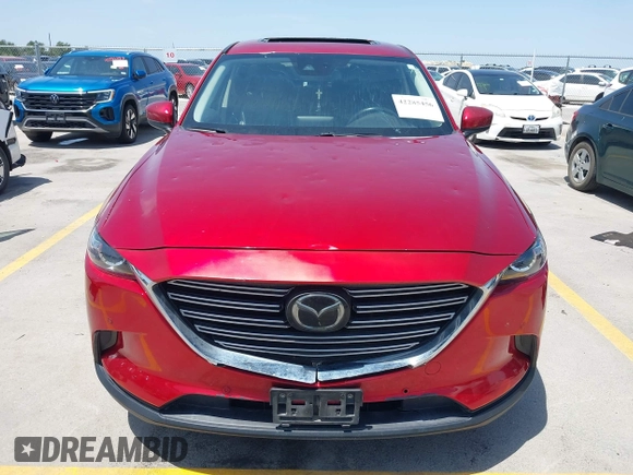 2018 Mazda CX-9 Touring with VIN JM3TCBCY6J0201556, listed as a IAAI auction lot 42285456 with 144,841 mi miles and . Bid and sale history available at DreamBid. Image 12.