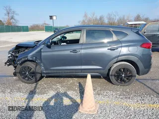 2019 Hyundai Tucson SE with VIN KM8J23A4XKU932814, listed as a IAAI auction lot 40968319 with 107,365 mi miles. Bid and sale history available at carsss.com. Image 14.