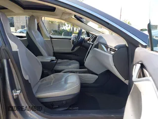 2014 Tesla Model S 60 with VIN 5YJSA1H19EFP36971, listed as a IAAI auction lot 42525811 with Not provided miles and . Bid and sale history available at DreamBid. Image 5.