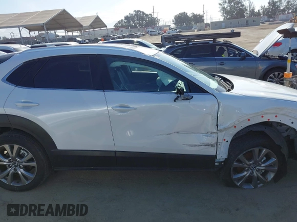 2024 Mazda CX-30 S Premium with VIN 3MVDMBDM4RM616159, listed as a IAAI auction lot 42328334 with 4,614 mi miles and . Bid and sale history available at DreamBid. Image 13.
