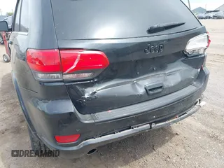2015 Jeep Grand Cherokee Altitude z VIN 1C4RJFAG5FC682058, wystawiony jako IAAI lot #42352814 z przebiegiem 228 067 mil mil oraz . Historia ofert i sprzedaży dostępna na DreamBid. Obrazek 6.