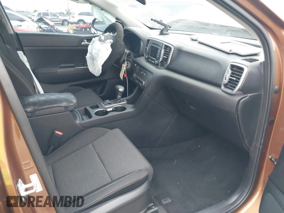 2018 Kia Sportage LX with VIN KNDPM3AC9J7481047, listed as a IAAI auction lot 41636184 with 160,385 mi miles. Bid and sale history available at carsss.com. Image 5.