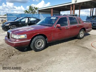 1996 Lincoln Town Car Signature with VIN 1LNLM82W3TY725921, listed as a Copart auction lot 72569054 with 109,073 mi miles and Salvage Title. Bid and sale history available at carsss.com. Image 1.