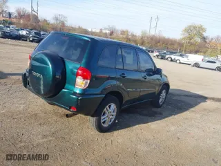 2003 Toyota RAV4 with VIN JTEGH20V830085832, listed as a IAAI auction lot 40903788 with 140,520 mi miles. Bid and sale history available at carsss.com. Image 4.