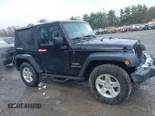 2017 Jeep Wrangler Sport z VIN 1C4GJWAG1HL502374, wystawiony jako IAAI lot #41938257 z przebiegiem 95 469 mil mil oraz . Historia ofert i sprzedaży dostępna na DreamBid. Obrazek 13.