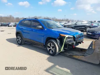 2018 Jeep Cherokee Trailhawk with VIN 1C4PJMBB2JD569069, listed as a IAAI auction lot 41651023 with 80,201 mi miles. Bid and sale history available at carsss.com. Image 1.
