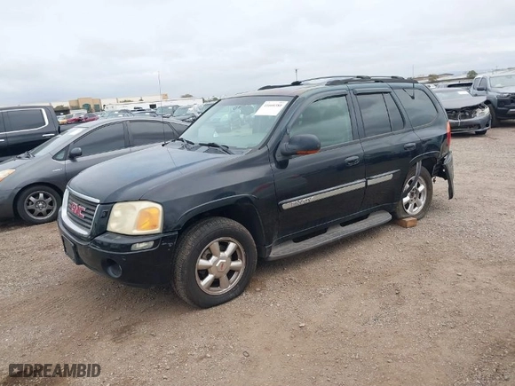2003 GMC Envoy SLT with VIN 1GKDS13S232298062, listed as a IAAI auction lot 41668380 with 195,045 mi miles. Bid and sale history available at carsss.com. Image 2.