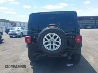 2023 Jeep Wrangler Sport S with VIN 1C4HJXDN5PW671167, listed as a IAAI auction lot 42176127 with 1,230 mi miles and . Bid and sale history available at DreamBid. Image 17.