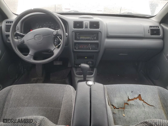 1998 Mazda Protege DX with VIN JM1BC1415W0202950, listed as a Copart auction lot 71992944 with 98,689 mi miles and Salvage Title. Bid and sale history available at carsss.com. Image 8.