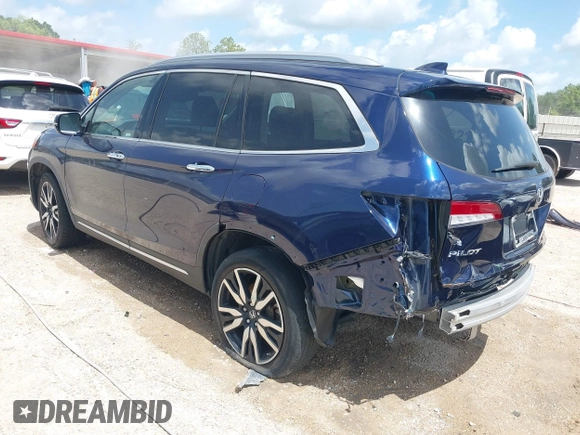 2022 Honda Pilot Touring 7-Passenger with VIN 5FNYF5H61NB019768, listed as a IAAI auction lot 42438780 with Not provided miles and . Bid and sale history available at DreamBid. Image 3.