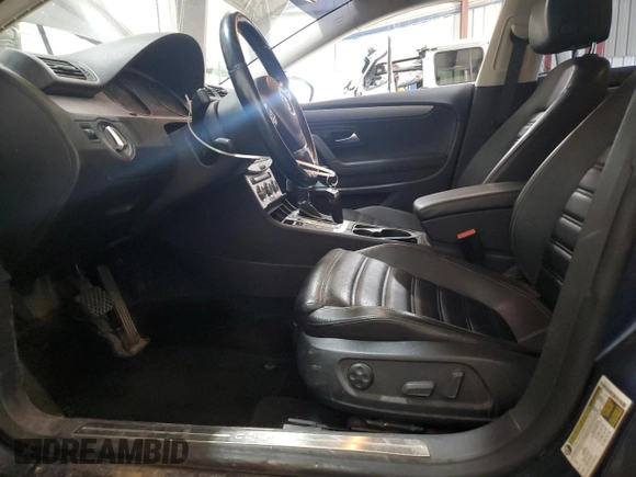 2013 Volkswagen CC Sport Plus z VIN WVWBP7ANXDE510033, wystawiony jako Copart lot #57266425 z przebiegiem 91 124 mil mil oraz Szkoda całkowita • Salvage title. Historia ofert i sprzedaży dostępna na DreamBid. Obrazek 7.