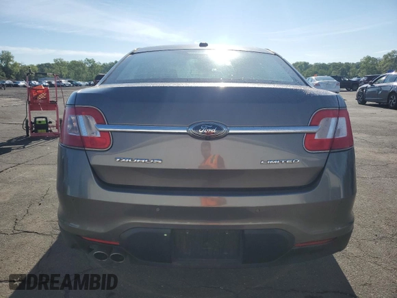 2011 Ford Taurus Limited z VIN 1FAHP2FW3BG146981, wystawiony jako Copart lot #58124275 z przebiegiem 64 163 mil mil oraz Szkoda całkowita • Salvage title. Historia ofert i sprzedaży dostępna na DreamBid. Obrazek 6.