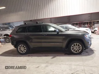 2014 Jeep Grand Cherokee Laredo with VIN 1C4RJEAG7EC145023, listed as a IAAI auction lot 40518825 with 115,098 mi miles and . Bid and sale history available at DreamBid. Image 13.
