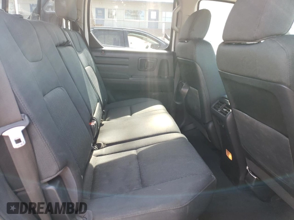 2013 Honda Ridgeline Sport with VIN 5FPYK1F71DB005942, listed as a Copart auction lot 53693385 with 182,385 mi miles and Salvage title. Bid and sale history available at DreamBid. Image 10.