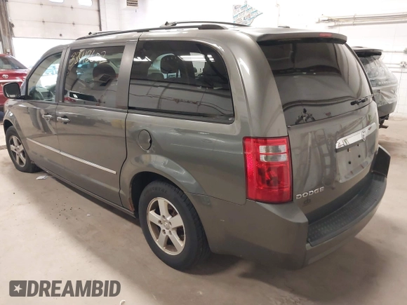 2010 Dodge Grand Caravan SXT z VIN 2D4RN5D14AR416488, wystawiony jako IAAI lot #38412602 z przebiegiem 136 997 mil mil oraz . Historia ofert i sprzedaży dostępna na DreamBid. Obrazek 3.