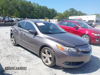 2014 Acura ILX Technology with VIN 19VDE1F73EE013345, listed as a IAAI auction lot 40193022 with 102,265 mi miles and . Bid and sale history available at DreamBid. Image 1.