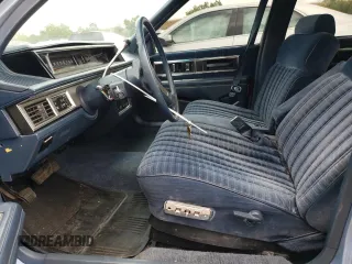 1989 Oldsmobile Delta z VIN 1G3HN54C8KH301125, wystawiony jako Copart lot #70709764 z przebiegiem 87 068 mil mil oraz Tytuł czysty. Historia ofert i sprzedaży dostępna na DreamBid. Obrazek 7.
