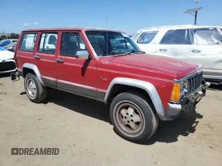 1992 Jeep Cherokee with VIN 1J4FJ58S0NL140995, listed as a Copart auction lot 56705875 with 253,657 mi miles and Salvage title. Bid and sale history available at DreamBid. Image 4.