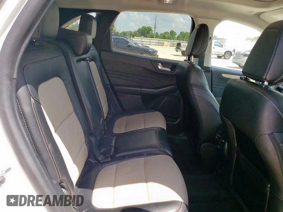 2021 Ford Escape Titanium Hybrid z VIN 1FMCU0DZ6MUA03327, wystawiony jako Copart lot #59558845 z przebiegiem 67 569 mil mil oraz Czysty tytuł • Clean title. Historia ofert i sprzedaży dostępna na DreamBid. Obrazek 11.