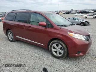 2014 Toyota Sienna LE AAS with VIN 5TDKK3DC9ES479130, listed as a Copart auction lot 57295025 with 207,850 mi miles and Non repairable. Bid and sale history available at DreamBid. Image 4.