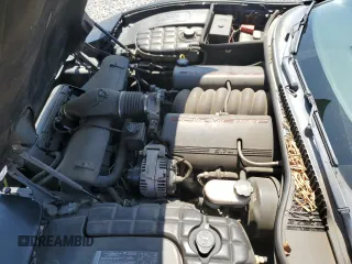 2004 Chevrolet Corvette with VIN 1G1YY22G145116083, listed as a Copart auction lot 52054735 with 158,087 mi miles and Salvage Title. Bid and sale history available at carsss.com. Image 12.