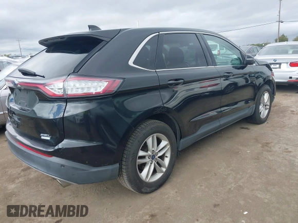 2015 Ford Edge SEL with VIN 2FMTK3J97FBB09189, listed as a IAAI auction lot 41627158 with 154,848 mi miles. Bid and sale history available at carsss.com. Image 4.