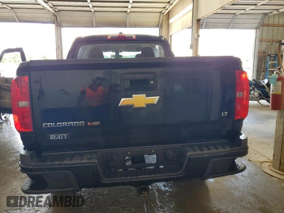 2018 Chevrolet Colorado 4WD LT with VIN 1GCGTCEN2J1283914, listed as a Copart auction lot 59359295 with 140,398 mi miles and Salvage title. Bid and sale history available at DreamBid. Image 6.