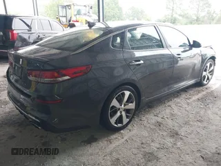 2019 Kia Optima LX z VIN 5XXGT4L35KG314960, wystawiony jako IAAI lot #42212868 z przebiegiem 113 920 mil mil oraz . Historia ofert i sprzedaży dostępna na DreamBid. Obrazek 4.