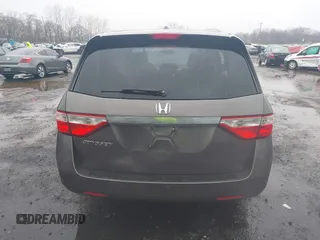 2012 Honda Odyssey EX-L with VIN 5FNRL5H64CB037689, listed as a IAAI auction lot 41857822 with 121,601 mi miles and . Bid and sale history available at carsss.com. Image 16.