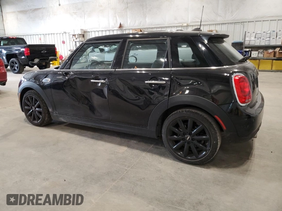 2021 MINI Hardtop 4 Door Oxford Edition with VIN WMWXU7C00M2N49230, listed as a Copart auction lot 77797914 with 51,877 mi miles and Salvage title. Bid and sale history available at DreamBid. Image 2.