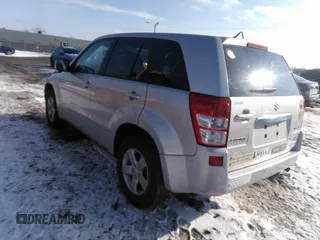 2013 Suzuki Grand Vitara Premium z VIN JS3TD0D6XD4100414, wystawiony jako IAAI lot #41351175 z przebiegiem 85 798 mil mil oraz . Historia ofert i sprzedaży dostępna na DreamBid. Obrazek 3.