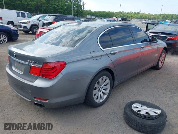2010 BMW 7 Series 750Li xDrive with VIN WBAKC8C51ACY68317, listed as a IAAI auction lot 42210033 with 124,765 mi miles and . Bid and sale history available at DreamBid. Image 4.